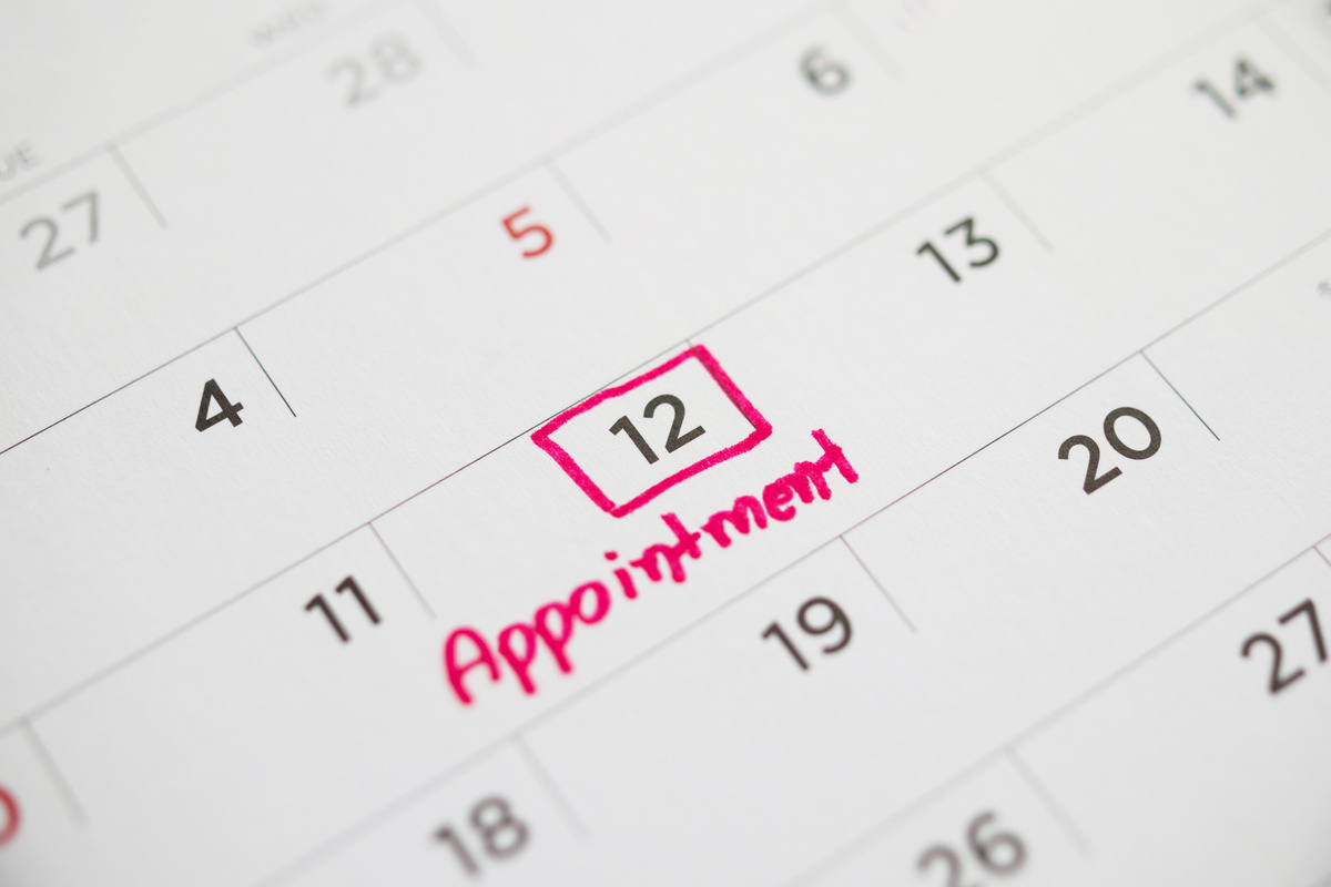 important appointment schedule write on white calendar page date